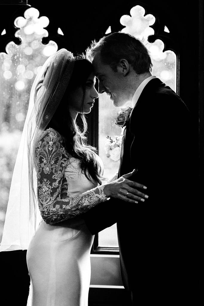 black and white couple photos autumn at Nutfield priory, Redhill