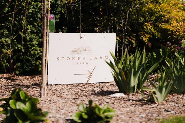 Stokes Farm Barn sign in the garden