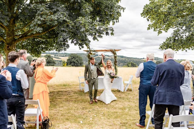 Outdoor summer ceremony at Hillfields Farm Wedding Venue